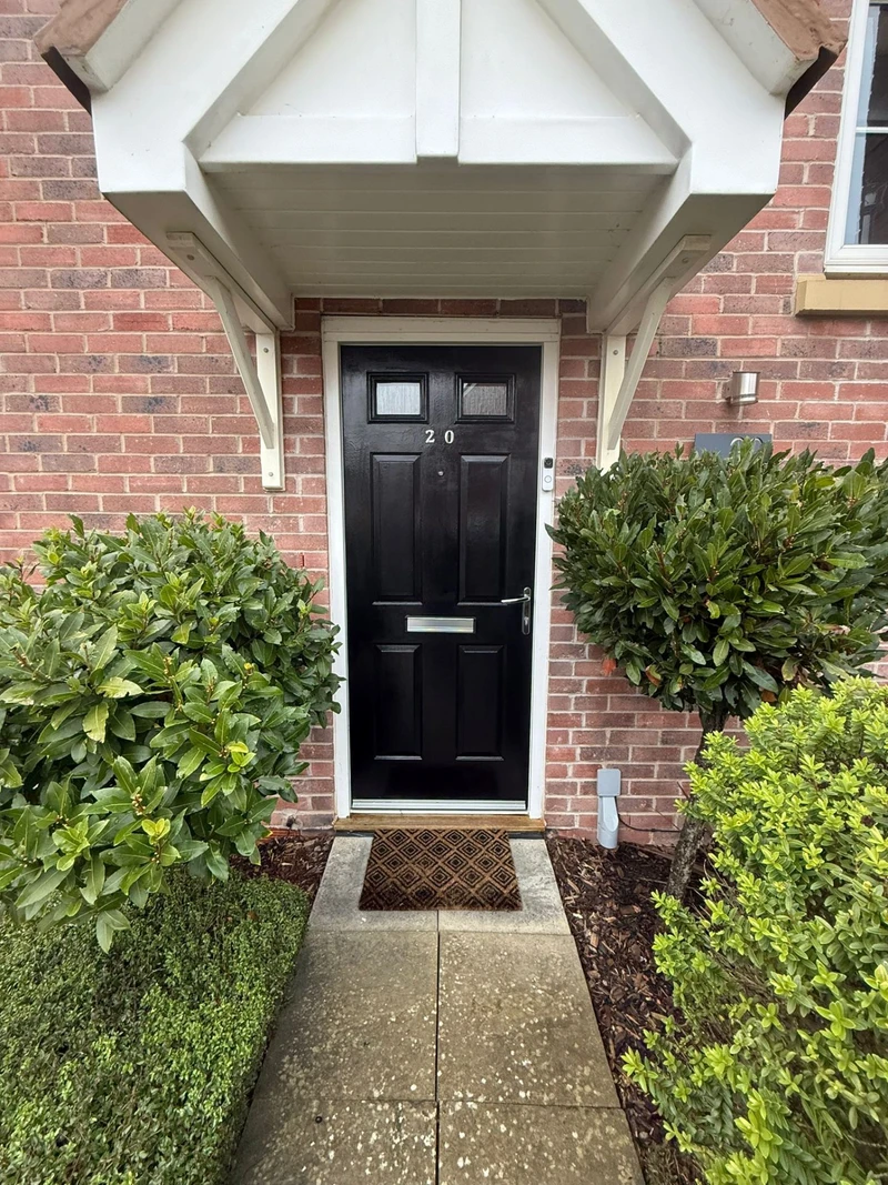 Classic black front door respray with white canopy by Spray Genius in Moseley, Birmingham