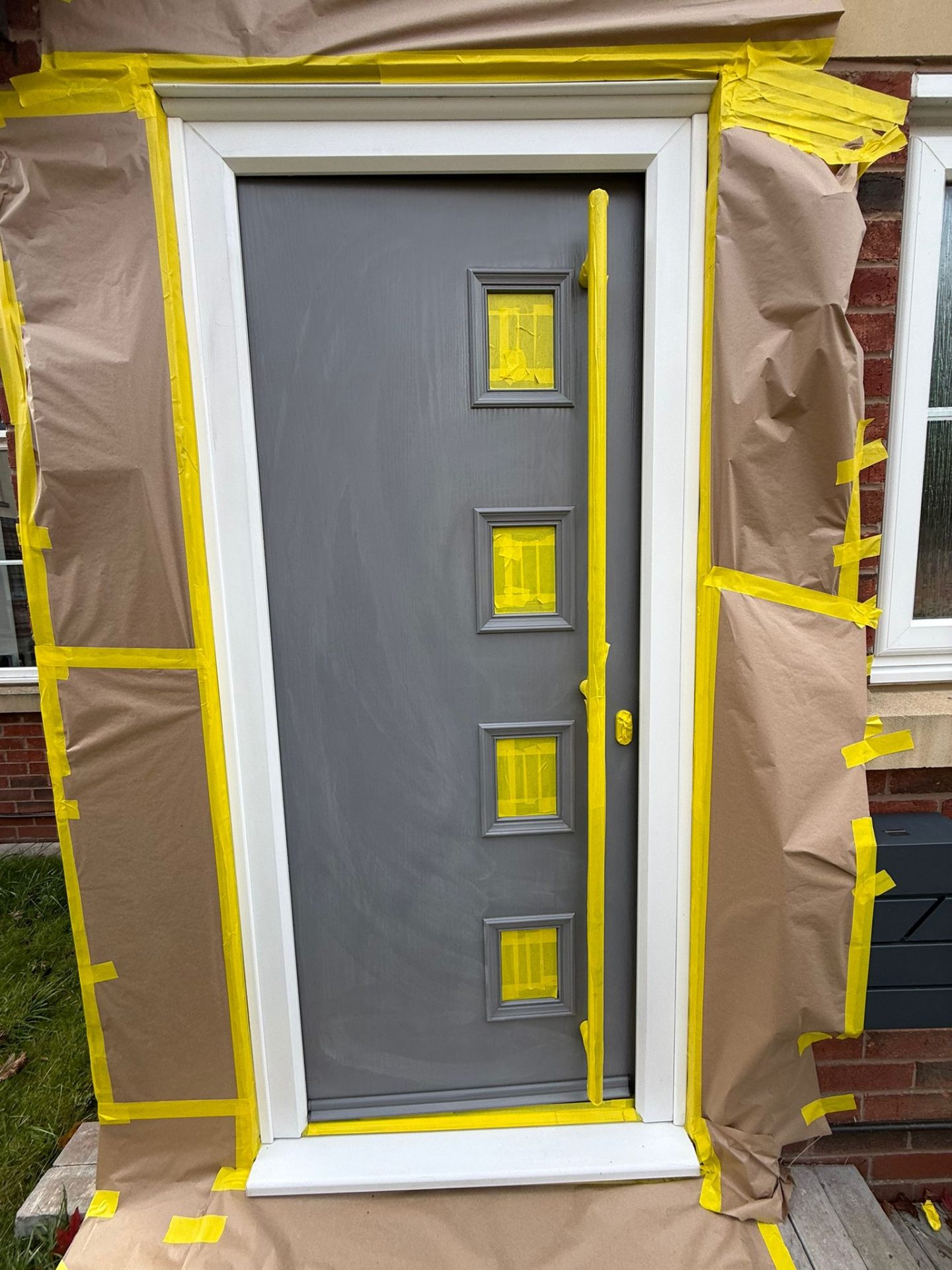 Grey door frame masking preparation