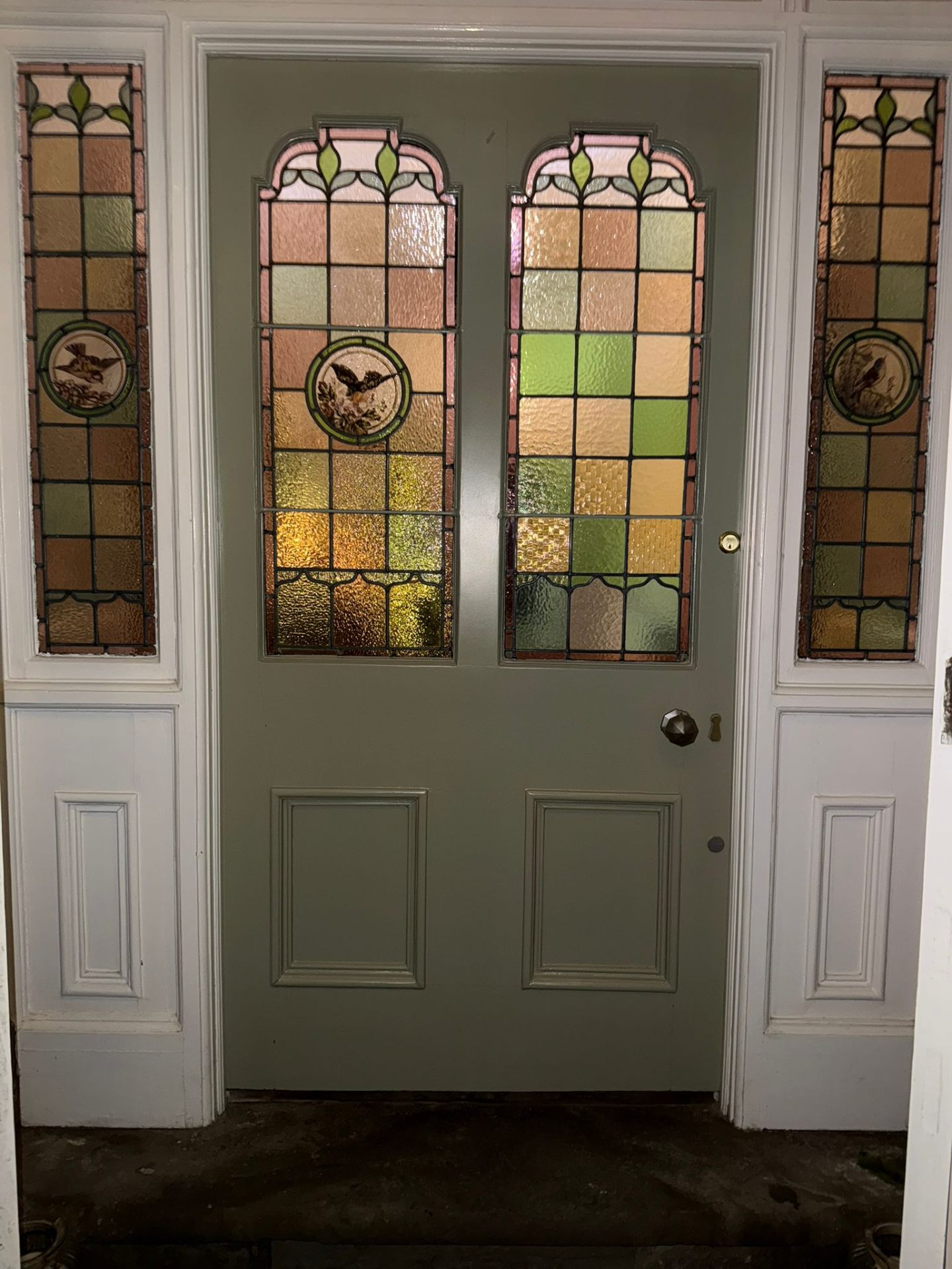 Sage door with stained glass