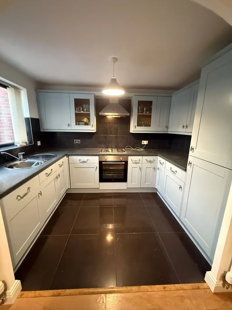 Soft blue kitchen cabinet respray by Spray Genius in Edgbaston, Birmingham