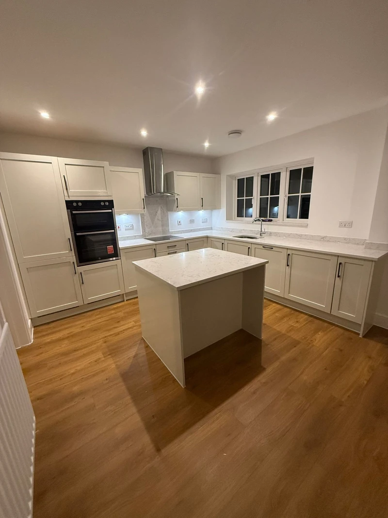 Cream shaker kitchen with island respray by Spray Genius in Solihull - professional cabinet finish